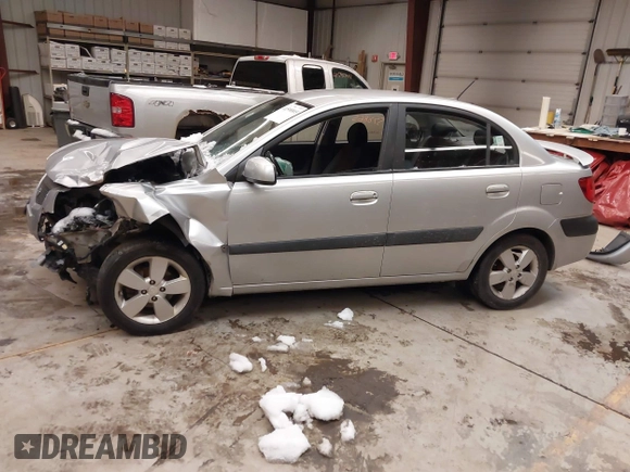 2009 Kia Rio LX with VIN KNADE223596444133, listed as a IAAI auction lot 41598865 with Not Provided miles and . Bid and sale history available at DreamBid. Image 14.