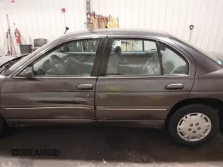 1996 Chevrolet Lumina with VIN 2G1WL52M7T9201086, listed as a IAAI auction lot 41490782 with 140,480 mi miles and . Bid and sale history available at DreamBid. Image 14.