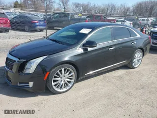 2014 Cadillac XTS Platinum with VIN 2G61W5S84E9127014, listed as a IAAI auction lot 41776334 with 99,879 mi miles. Bid and sale history available at carsss.com. Image 2.
