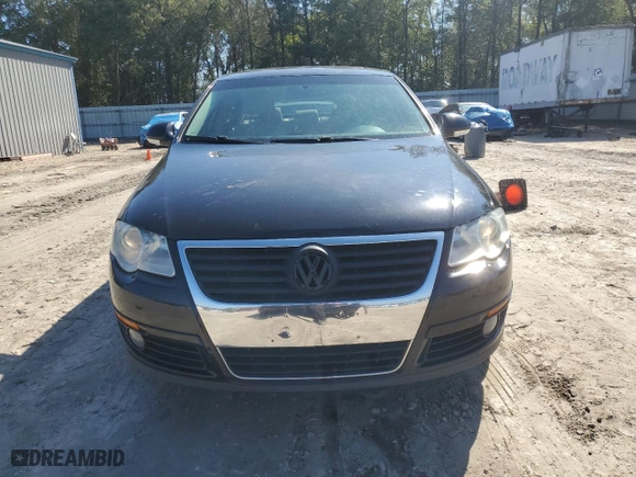 2009 Volkswagen Passat Sedan Komfort with VIN WVWJK73C79P054302, listed as a Copart auction lot 46431545 with 144,170 mi miles and Salvage Title. Bid and sale history available at carsss.com. Image 5.