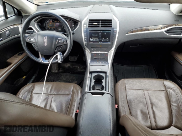 2014 Lincoln MKZ z VIN 3LN6L2G93ER811683, wystawiony jako Copart lot #52004485 z przebiegiem 188 134 mil mil oraz Szkoda całkowita • Salvage title. Historia ofert i sprzedaży dostępna na DreamBid. Obrazek 8.