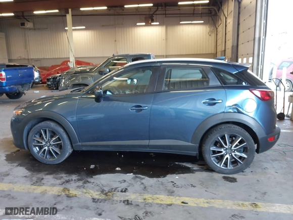 2018 Mazda CX-3 Touring with VIN JM1DKFC78J1323439, listed as a IAAI auction lot 41725784 with 134,055 mi miles. Bid and sale history available at carsss.com. Image 14.