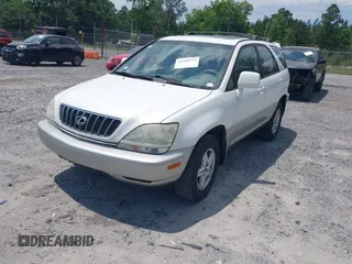 2001 Lexus RX 300 z VIN JTJHF10U810170065, wystawiony jako IAAI lot #42308279 z przebiegiem 310 039 mil mil oraz . Historia ofert i sprzedaży dostępna na DreamBid. Obrazek 2.