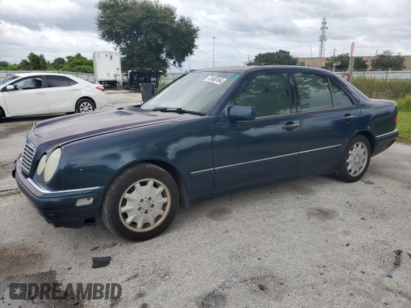 1997 Mercedes-Benz E-Class with VIN WDBJF55F4VJ025769, listed as a Copart auction lot 73460164 with 0 mi miles and Salvage Title. Bid and sale history available at carsss.com. Image 1.