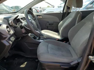 2014 Chevrolet Sonic LS with VIN 1G1JA5SH1E4241785, listed as a Copart auction lot 61914455 with 95,014 mi miles and Clean title. Bid and sale history available at DreamBid. Image 7.