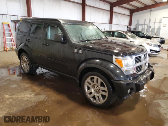 2007 Dodge Nitro SLT z VIN 1D8GU58K17W657064, wystawiony jako Copart lot #53133925 z przebiegiem 126 106 mil mil oraz Szkoda całkowita • Salvage title. Historia ofert i sprzedaży dostępna na DreamBid. Obrazek 4.