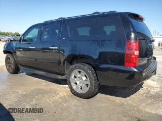 2014 Chevrolet Suburban LT with VIN 1GNSCJE04ER156583, listed as a Copart auction lot 73730364 with 243,131 mi miles and Clean Title. Bid and sale history available at carsss.com. Image 2.