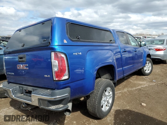 2019 GMC Canyon z VIN 1GTP6CE12K1174133, wystawiony jako Copart lot #51242875 z przebiegiem 182 902 mil mil oraz Szkoda całkowita • Salvage title. Historia ofert i sprzedaży dostępna na DreamBid. Obrazek 3.