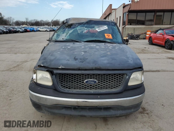 2000 Ford F-150 XL with VIN 2FTZF0728YCA61923, listed as a Copart auction lot 49672515 with 0 mi miles and Salvage Title. Bid and sale history available at carsss.com. Image 5.