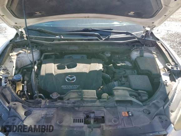 2015 Mazda CX-5 Grand Touring with VIN JM3KE2DY1F0453386, listed as a Copart auction lot 50580185 with 174,309 mi miles and Salvage Title. Bid and sale history available at carsss.com. Image 12.