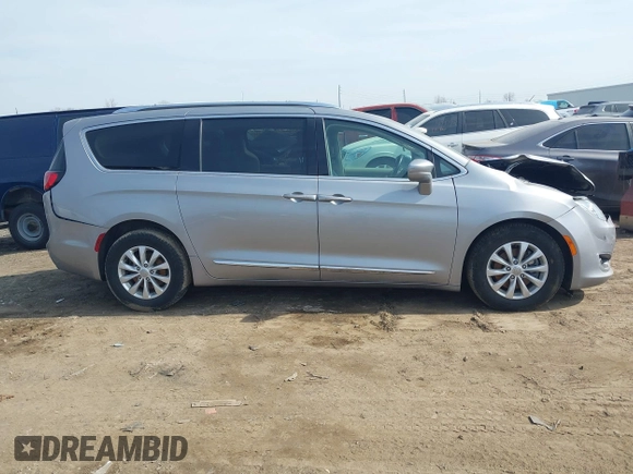 2018 Chrysler Pacifica Touring L with VIN 2C4RC1BG7JR101736, listed as a IAAI auction lot 41776231 with 90,487 mi miles and . Bid and sale history available at DreamBid. Image 13.