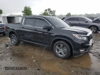 2023 Honda Ridgeline RTL with VIN 5FPYK3F51PB067811, listed as a Copart auction lot 56795995 with 21,500 mi miles and Salvage title. Bid and sale history available at DreamBid. Image 4.