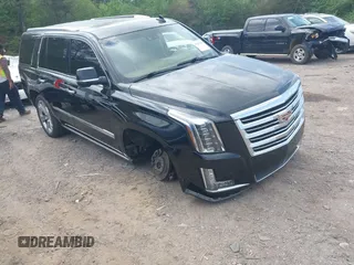 2016 Cadillac Escalade Platinum z VIN 1GYS3DKJ7GR374845, wystawiony jako IAAI lot #41951693 z przebiegiem 93 820 mil mil oraz . Historia ofert i sprzedaży dostępna na DreamBid. Obrazek 1.