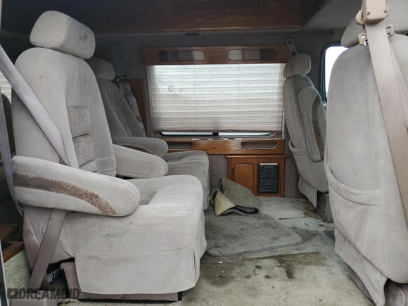 1999 Dodge Ram Van Conversion with VIN 2B6HB11Y0XK505623, listed as a Copart auction lot 71873994 with NaN miles and Non Repairable. Bid and sale history available at carsss.com. Image 11.