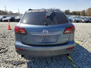 2015 Mazda CX-9 Grand Touring with VIN JM3TB2DA1F0469734, listed as a Copart auction lot 48728895 with 0 mi miles and Salvage Title. Bid and sale history available at carsss.com. Image 6.