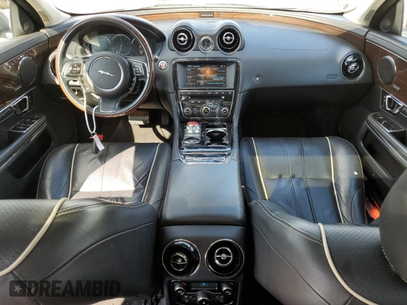 2015 Jaguar XJ Portfolio with VIN SAJWJ2GD2F8V75238, listed as a Copart auction lot 73633984 with 102,545 mi miles and Salvage title. Bid and sale history available at DreamBid. Image 8.