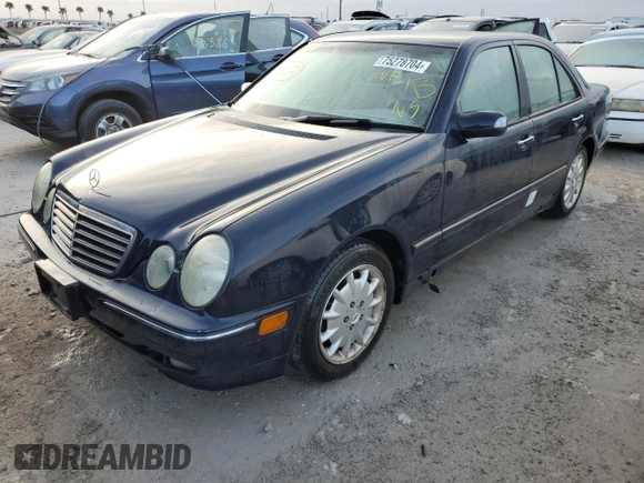 2000 Mercedes-Benz E-Class with VIN WDBJF65J7YB047628, listed as a Copart auction lot 75278704 with 0 mi miles and Salvage Title. Bid and sale history available at carsss.com. Image 1.