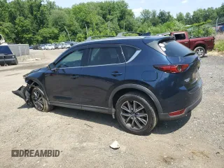 2018 Mazda CX-5 Grand Touring with VIN JM3KFBDM8J0342272, listed as a Copart auction lot 61930115 with 119,727 mi miles and Salvage title. Bid and sale history available at DreamBid. Image 2.