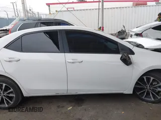 2019 Toyota Corolla L with VIN 5YFBURHE7KP862111, listed as a IAAI auction lot 42205368 with 96,823 mi miles and . Bid and sale history available at DreamBid. Image 14.