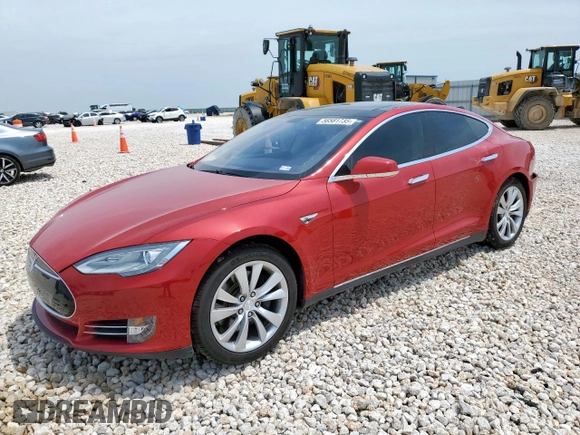 2014 Tesla Model S 60 with VIN 5YJSA1H18EFP38582, listed as a Copart auction lot 56581735 with 69,106 mi miles and Salvage title. Bid and sale history available at DreamBid. Image 1.