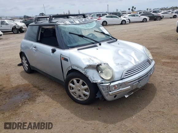 2004 MINI Hardtop with VIN WMWRC33434TJ57506, listed as a IAAI auction lot 42117581 with 148,483 mi miles and . Bid and sale history available at DreamBid. Image 1.