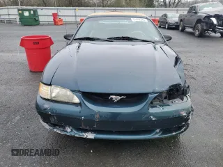 1994 Ford Mustang z VIN 1FALP45T3RF143074, wystawiony jako Copart lot #51442685 z przebiegiem 144 966 mil mil oraz Szkoda całkowita • Salvage title. Historia ofert i sprzedaży dostępna na DreamBid. Obrazek 5.