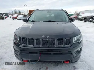 2018 Jeep Compass Trailhawk with VIN 3C4NJDDB3JT450932, listed as a IAAI auction lot 41616316 with 107,198 mi miles and . Bid and sale history available at DreamBid. Image 12.