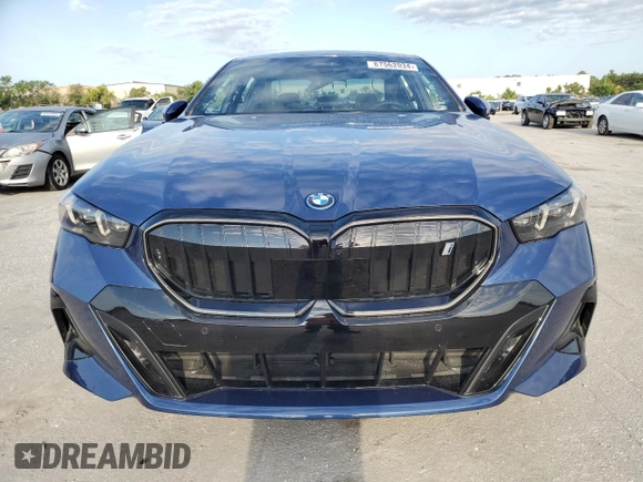 2024 BMW i5 eDrive40 with VIN WBY33FK00RCR76973, listed as a Copart auction lot 67562934 with 4,315 mi miles and Salvage Title. Bid and sale history available at carsss.com. Image 5.