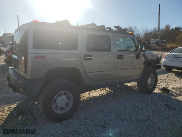 2003 Hummer H2 with VIN 5GRGN23U23H138301, listed as a Copart auction lot 77449044 with 172,174 mi miles and Salvage Title. Bid and sale history available at carsss.com. Image 3.