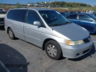 2002 Honda Odyssey EX-L z VIN 2HKRL18922H582244, wystawiony jako IAAI lot #42385121 z przebiegiem 253 186 mil mil oraz . Historia ofert i sprzedaży dostępna na DreamBid. Obrazek 1.