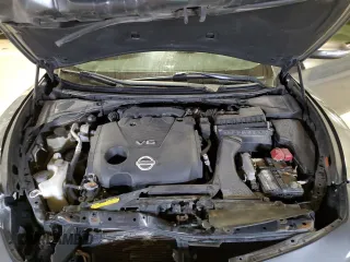 2014 Nissan Maxima SV z VIN 1N4AA5AP9EC478102, wystawiony jako Copart lot #52413845 z przebiegiem 104 615 mil mil oraz Szkoda całkowita • Salvage title. Historia ofert i sprzedaży dostępna na DreamBid. Obrazek 11.