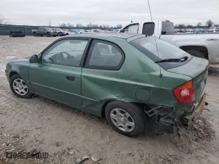 2005 Hyundai Accent GLS with VIN KMHCG35C05U356585, listed as a Copart auction lot 40091384 with 60,289 mi miles and Salvage Title. Bid and sale history available at carsss.com. Image 2.