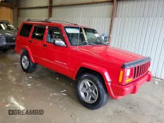2001 Jeep Cherokee Sport with VIN 1J4FF58S01L519670, listed as a Copart auction lot 84340454 with 132,584 mi miles and Clean title. Bid and sale history available at DreamBid. Image 4.