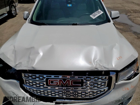 2017 GMC Acadia Denali with VIN 1GKKNPLS8HZ327113, listed as a Copart auction lot 58431595 with 102,061 mi miles and Salvage title. Bid and sale history available at DreamBid. Image 11.
