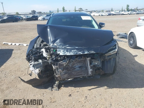 2022 Mazda CX-30 S Premium with VIN 3MVDMBDL6NM407913, listed as a IAAI auction lot 42359860 with 35,804 mi miles and . Bid and sale history available at DreamBid. Image 13.