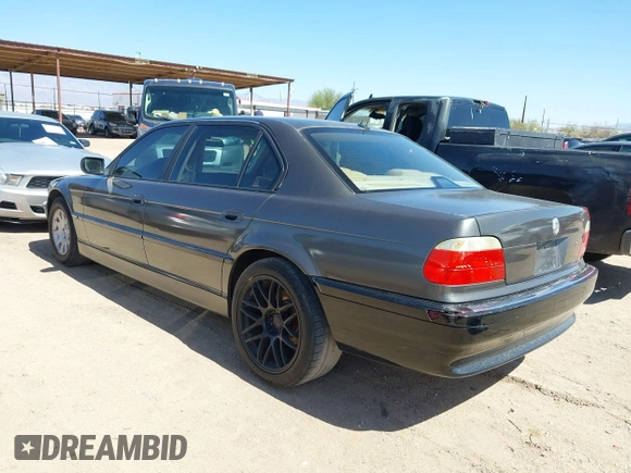 2001 BMW 7 Series 740iL with VIN WBAGH83421DP25417, listed as a IAAI auction lot 41725971 with 165,599 mi miles. Bid and sale history available at carsss.com. Image 3.