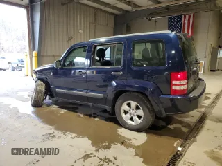 2012 Jeep Liberty Sport with VIN 1C4PJMAK1CW129000, listed as a Copart auction lot 49472635 with 77,124 mi miles and Salvage Title. Bid and sale history available at DreamBid. Image 2.