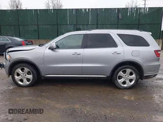 2014 Dodge Durango Limited with VIN 1C4SDJDTXEC286906, listed as a IAAI auction lot 41962120 with 111,309 mi miles and . Bid and sale history available at DreamBid. Image 14.