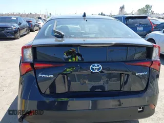 2020 Toyota Prius L Eco z VIN JTDKARFU1L3117772, wystawiony jako IAAI lot #40077005 z przebiegiem 71 892 mil mil oraz . Historia ofert i sprzedaży dostępna na DreamBid. Obrazek 16.