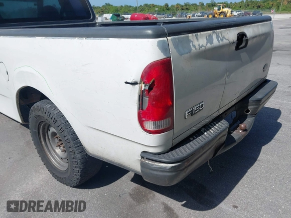 1999 Ford F-150 with VIN 1FTRX17W6XNB60822, listed as a IAAI auction lot 42310975 with Not provided miles and . Bid and sale history available at DreamBid. Image 6.