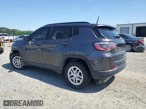 2018 Jeep Compass Sport with VIN 3C4NJCABXJT105430, listed as a Copart auction lot 59237575 with 104,600 mi miles and Salvage title. Bid and sale history available at DreamBid. Image 2.