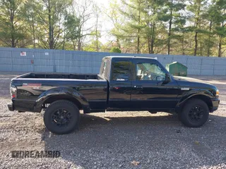 2011 Ford Ranger XLT with VIN 1FTLR4FE9BPB07796, listed as a IAAI auction lot 42128597 with 235,512 mi miles. Bid and sale history available at carsss.com. Image 14.