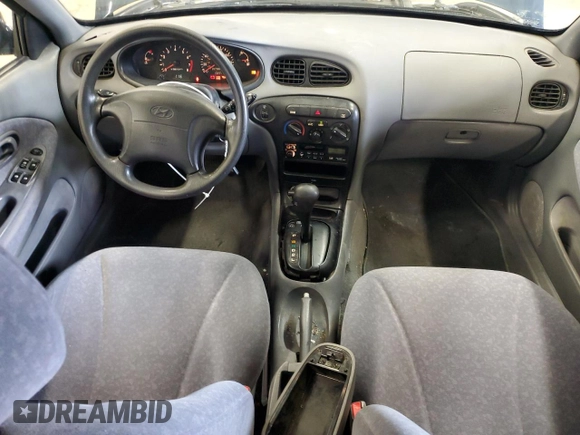 2000 Hyundai Elantra z VIN KMHJW35F5YU181324, wystawiony jako Copart lot #48016775 z przebiegiem 79 686 mil mil oraz Czysty tytuł • Clean title. Historia ofert i sprzedaży dostępna na DreamBid. Obrazek 8.