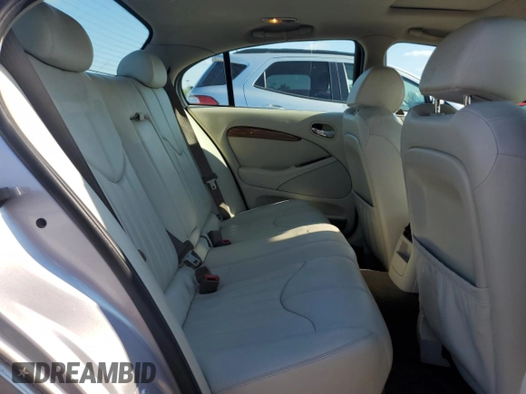 2002 Jaguar S-Type with VIN SAJDA01P52GM27504, listed as a Copart auction lot 57850944 with 119,707 mi miles and Clean Title. Bid and sale history available at DreamBid. Image 10.