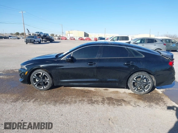 2022 Kia K5 GT-Line z VIN 5XXG64J2XNG139790, wystawiony jako IAAI lot #41737680 z przebiegiem 34 738 mil mil oraz . Historia ofert i sprzedaży dostępna na DreamBid. Obrazek 14.