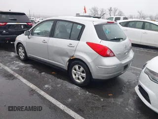 2009 Nissan Versa 1.8 SL with VIN 3N1BC13E59L420840, listed as a IAAI auction lot 41503232 with 129,824 mi miles. Bid and sale history available at carsss.com. Image 3.
