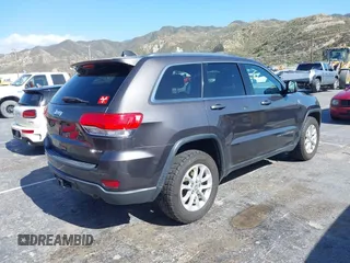 2016 Jeep Grand Cherokee Laredo z VIN 1C4RJFAG5GC390413, wystawiony jako IAAI lot #42254165 z przebiegiem 99 231 mil mil oraz . Historia ofert i sprzedaży dostępna na DreamBid. Obrazek 4.