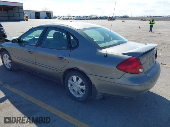 2003 Ford Taurus SES Standard with VIN 1FAFP55283G168564, listed as a IAAI auction lot 41884130 with 199,923 mi miles and . Bid and sale history available at DreamBid. Image 3.