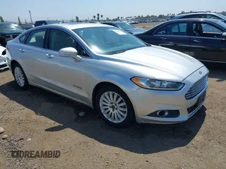 2014 Ford Fusion SE Hybrid with VIN 3FA6P0LU6ER270190, listed as a IAAI auction lot 42467367 with 188,864 mi miles and . Bid and sale history available at DreamBid. Image 1.