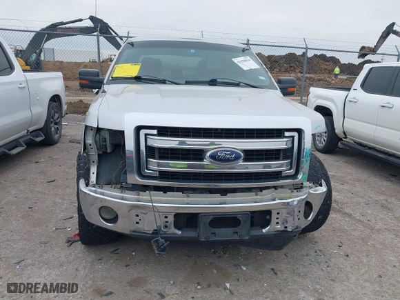 2013 Ford F-150 XL with VIN 1FTEW1CM9DFA20565, listed as a IAAI auction lot 41628818 with 243,884 mi miles. Bid and sale history available at carsss.com. Image 12.